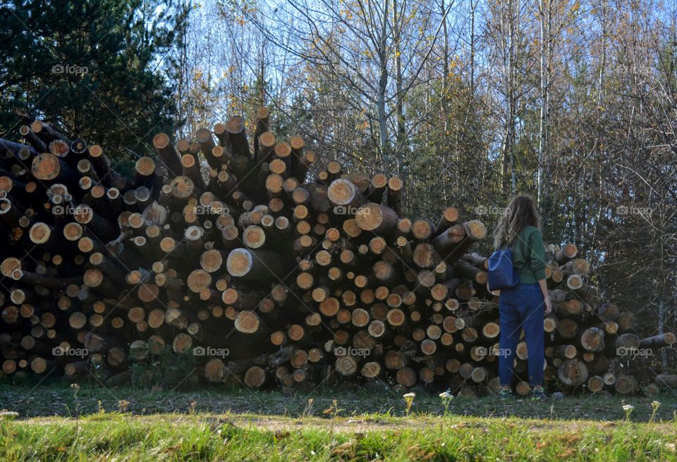 girl outdoor and cut trees round beautiful texture