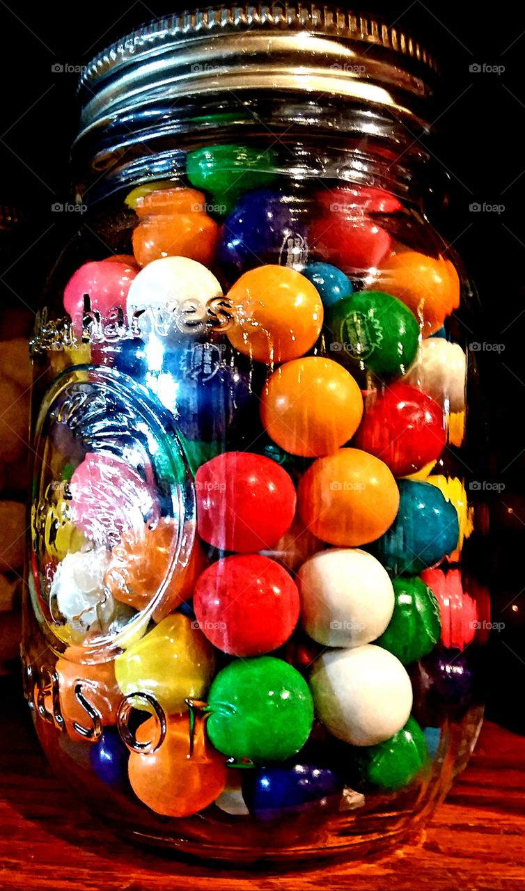 clash of color colorful candy in a jar