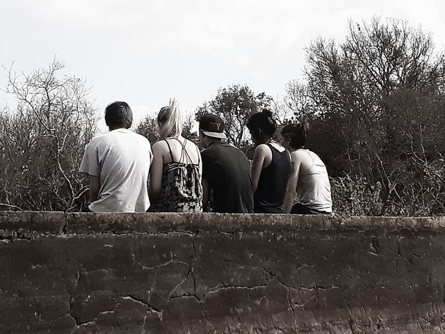 sitting with friends