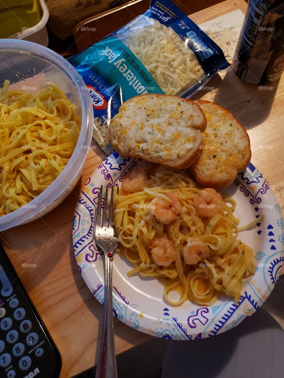 shrimp scampi worth linguini and garlic bread