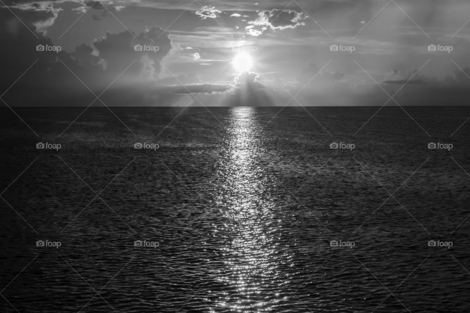 Sunset over the ocean, black and white 