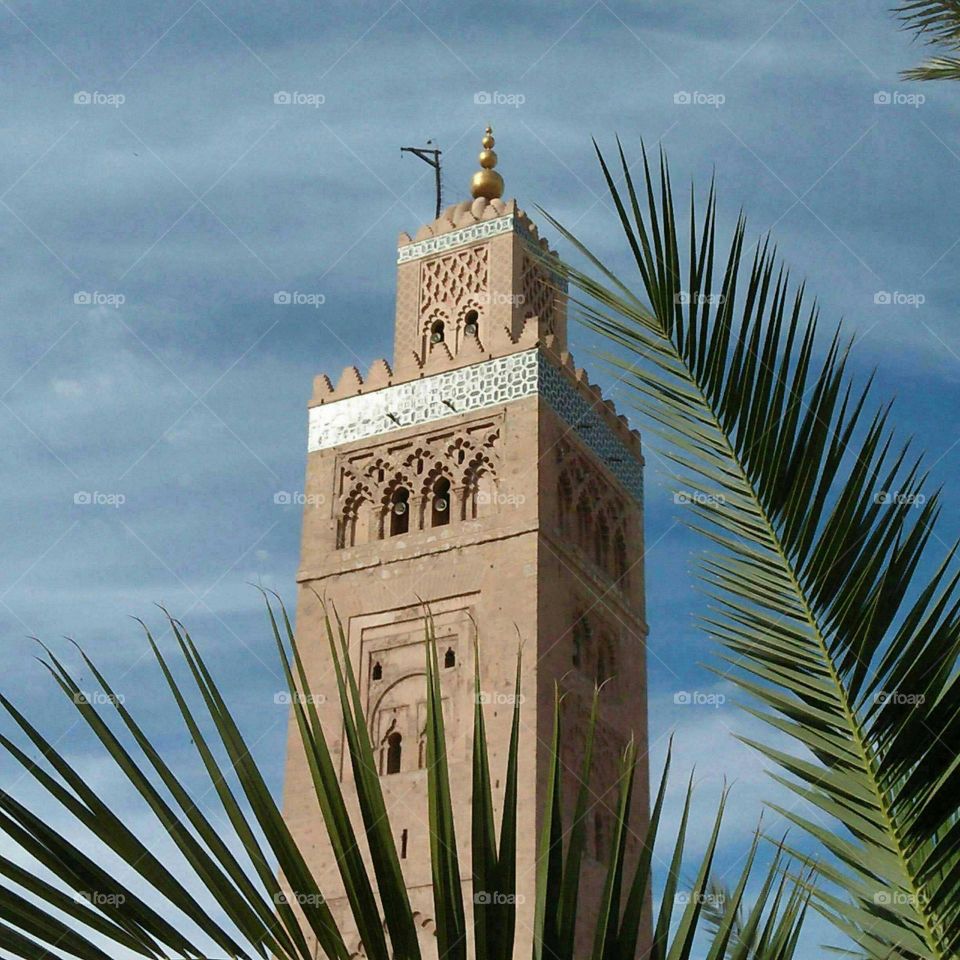 Beautiful and ancient minaret of Kotoubia mosque at marrakech city in Morocco.