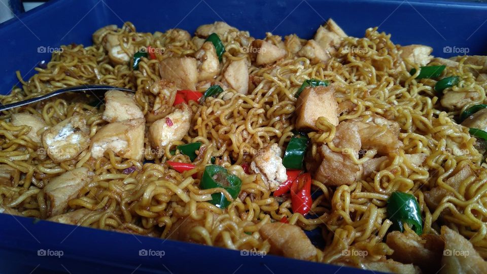 Tofu noodle dishes that are ready to be served or eaten