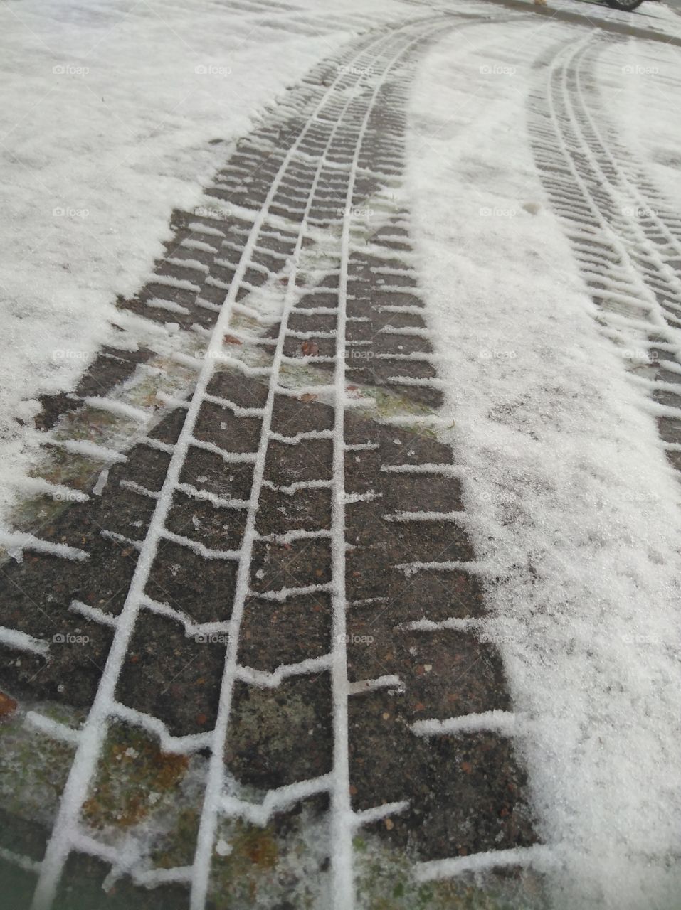 car trails in the snow