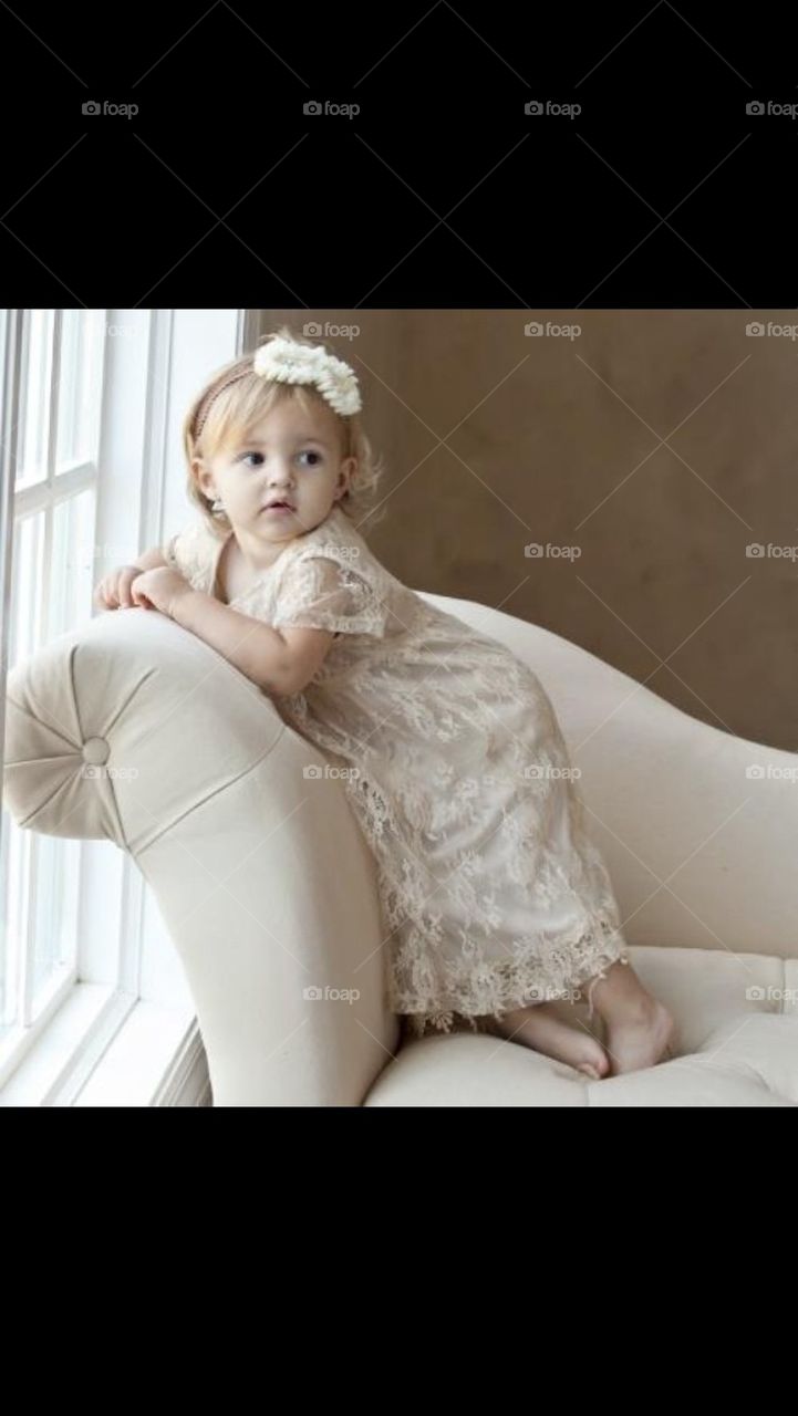 Little Girl Modeling on Couch