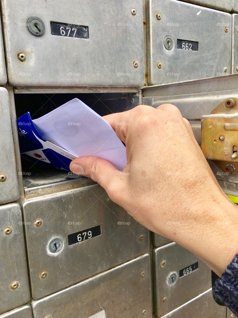 Taking out letters from the mailbox