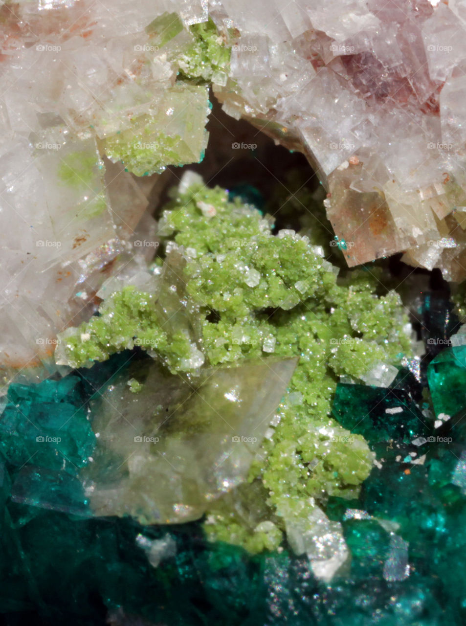 Green minerals, pink crystals 