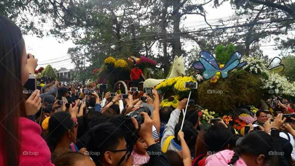 Panagbenga Festival at Baguio City, Philippines.

Also known as flower festival, It is a month-long annual flower festival occuring in Baguio. The term is of Kankanaey origin, meaning "season of blooming"