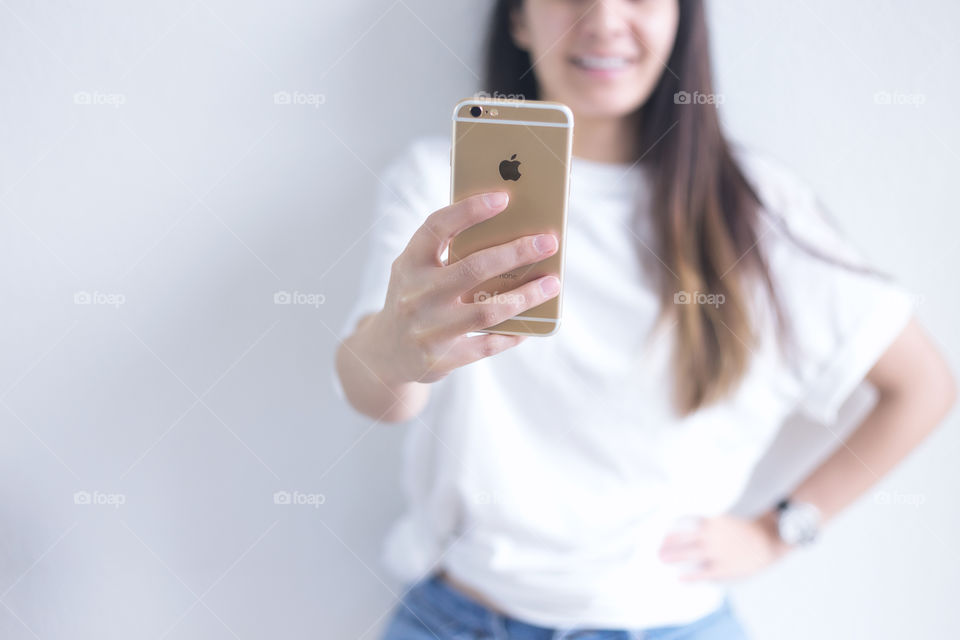 A lady taking a selfie 