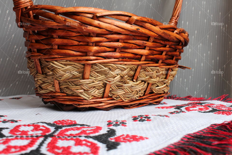 traditional basket on colorful patterns towel