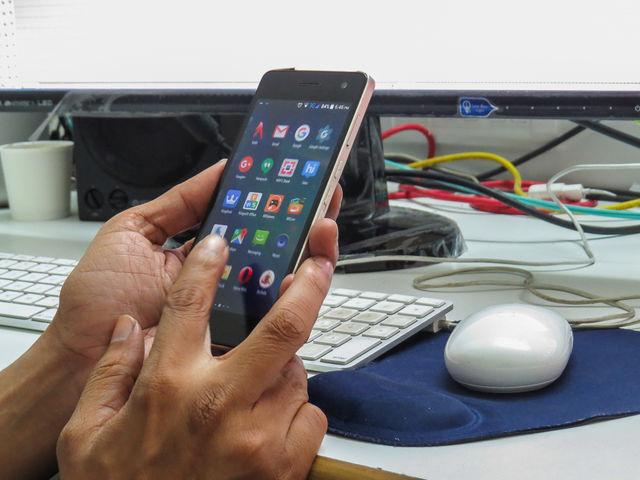 man holding android phone