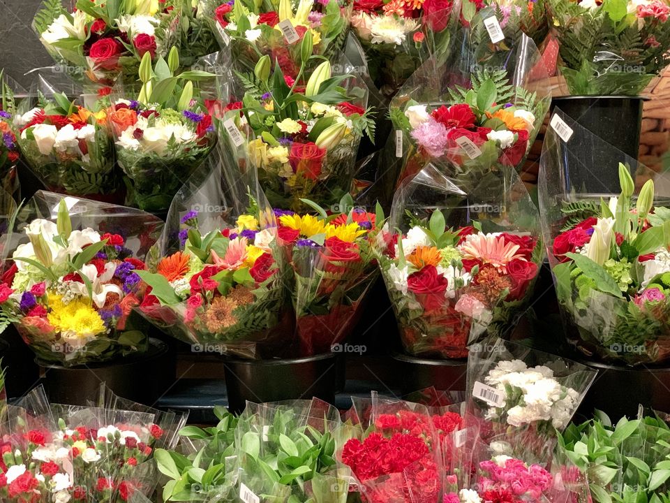 Variety of beautiful followers blossoms in different lovely colors in the flower shop.