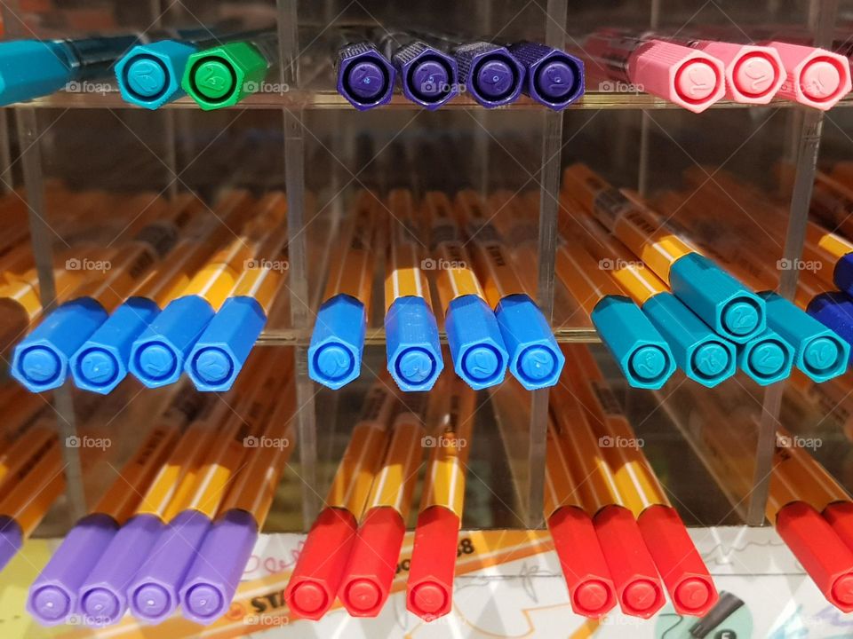colorful highlighter, displayed on glass shelf, suitable for employees student officer school children, lighter collor, red green blue yellow pink purple