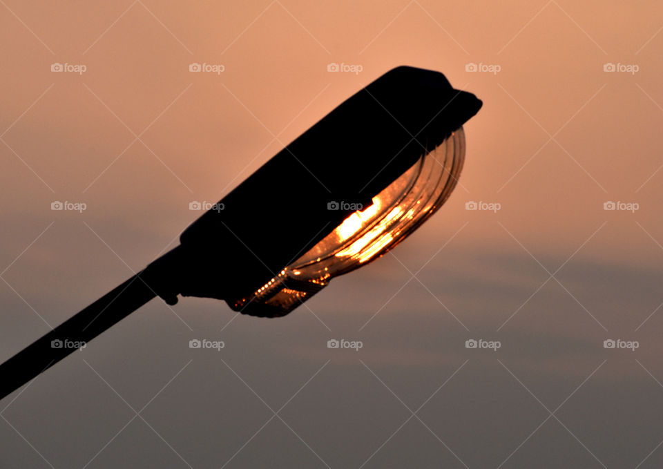 Natural light Vs Artificial light can see in the same image.