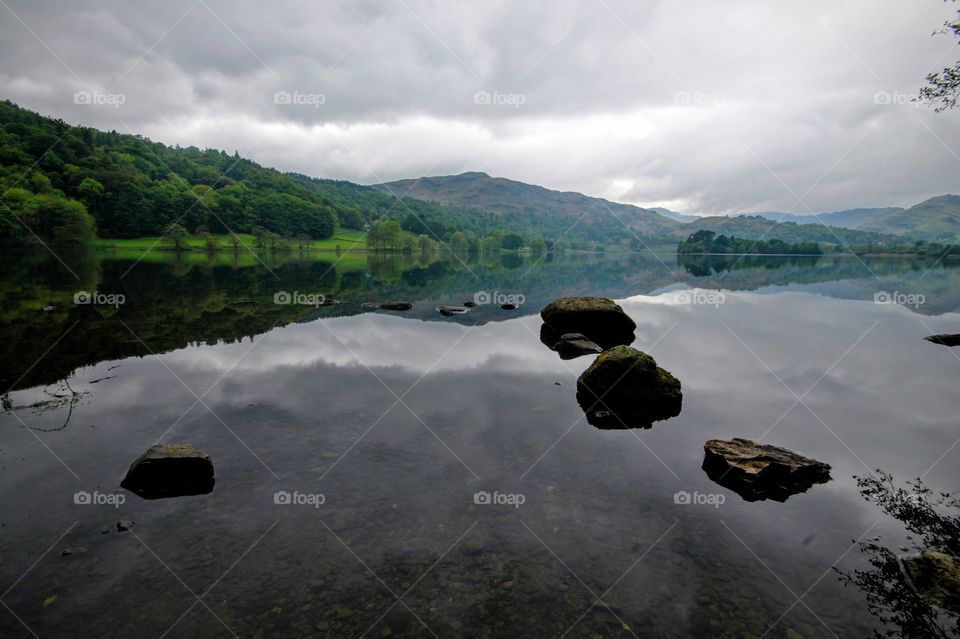 Reflection of hills in river