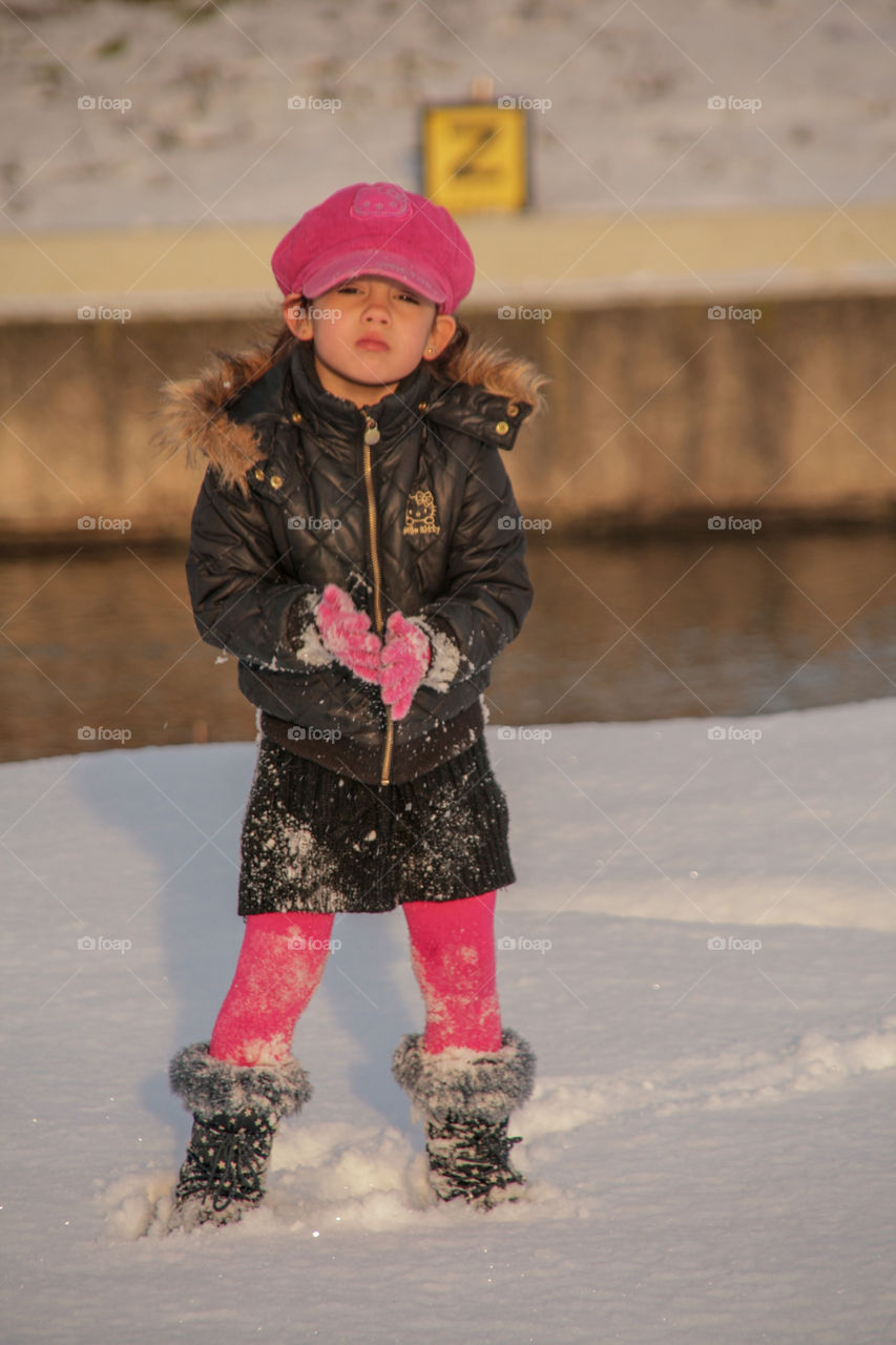 Portrait of girl standing in winter