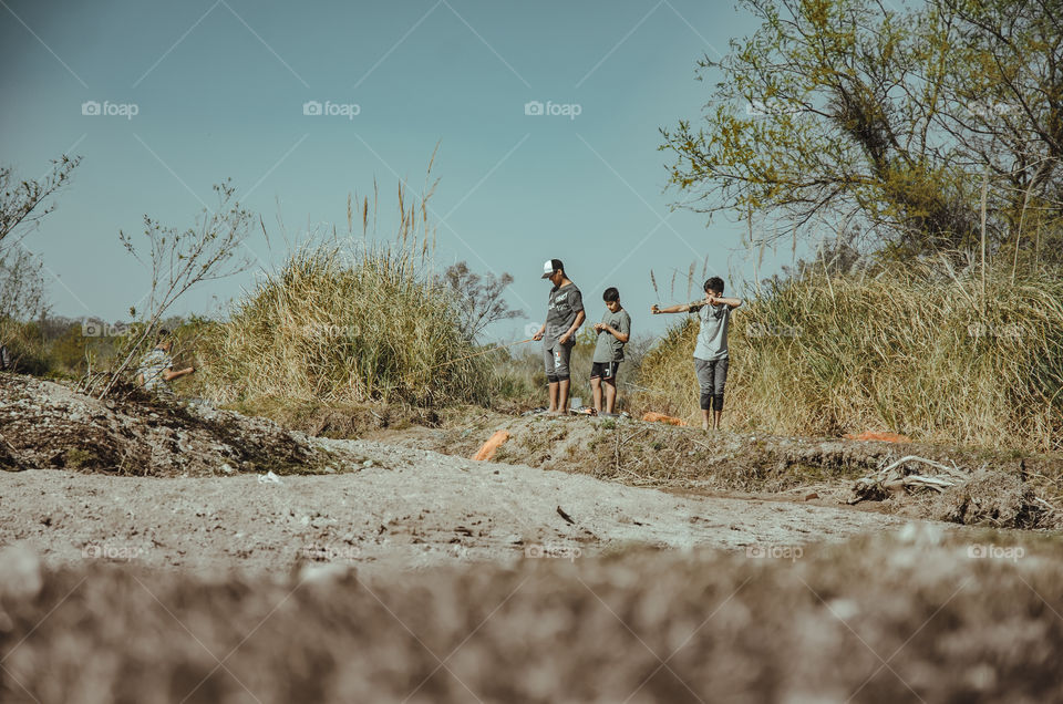 crocodile fishing in dry river