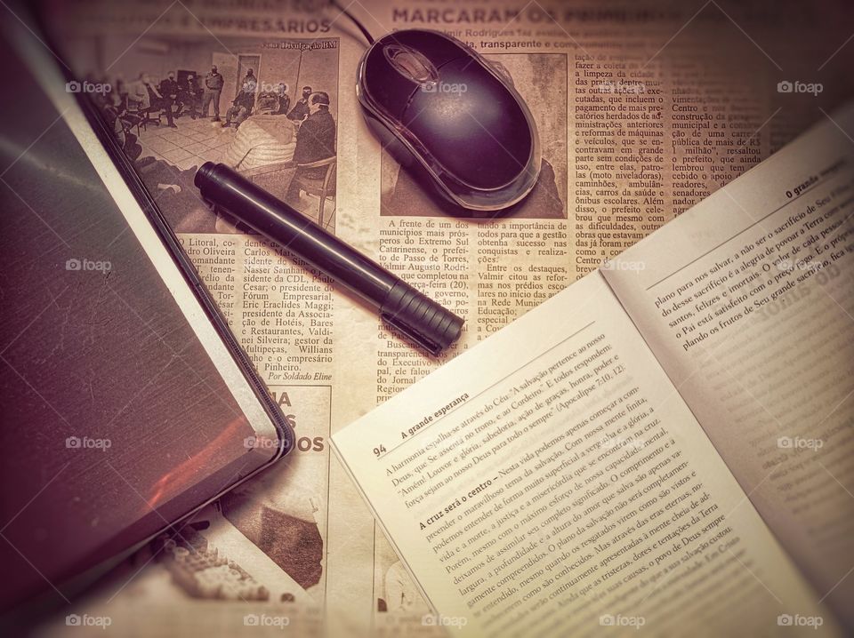 Newspaper, book and vintage notebook