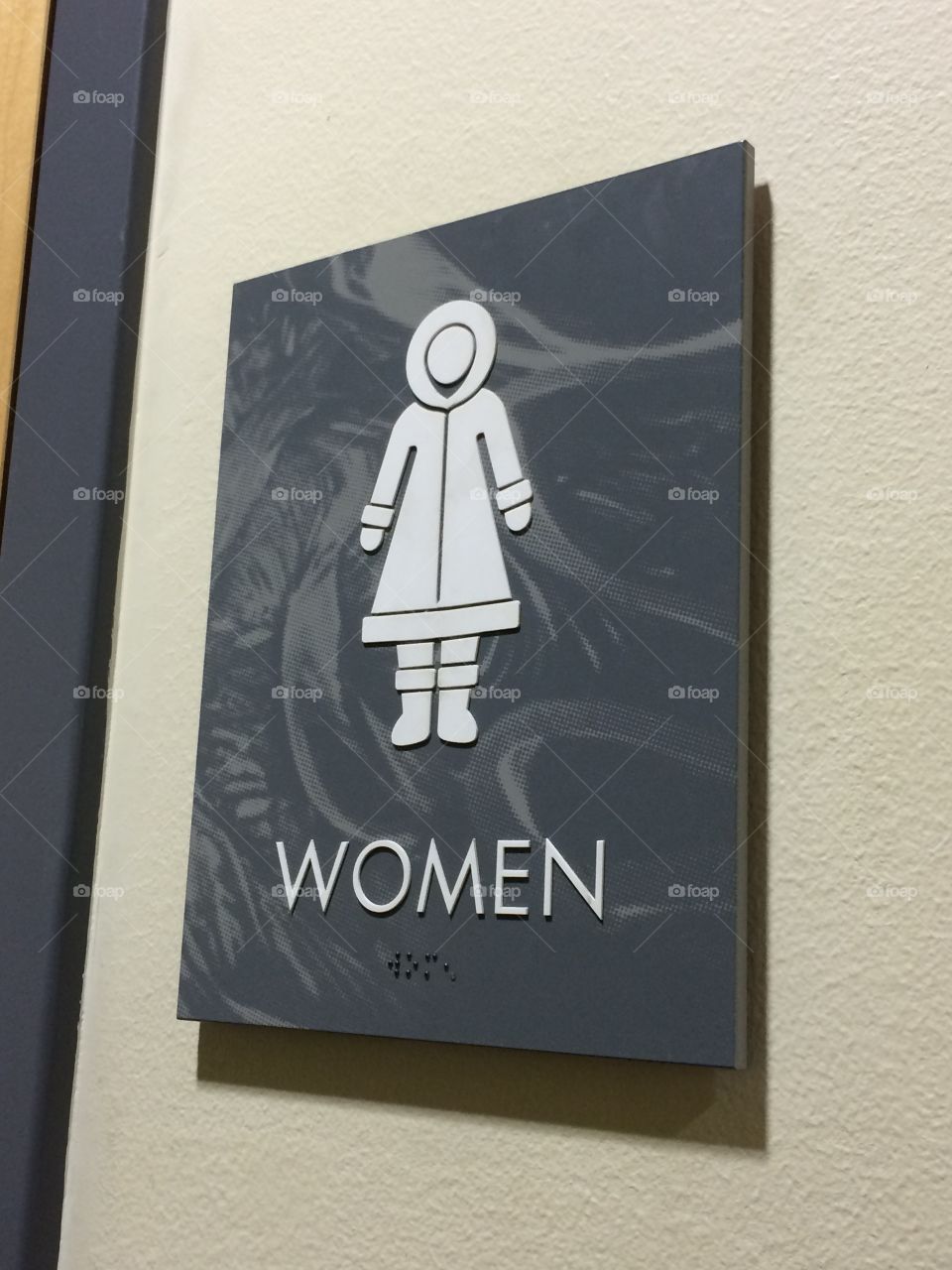 Alaskan Eskimo women’s bathroom sign