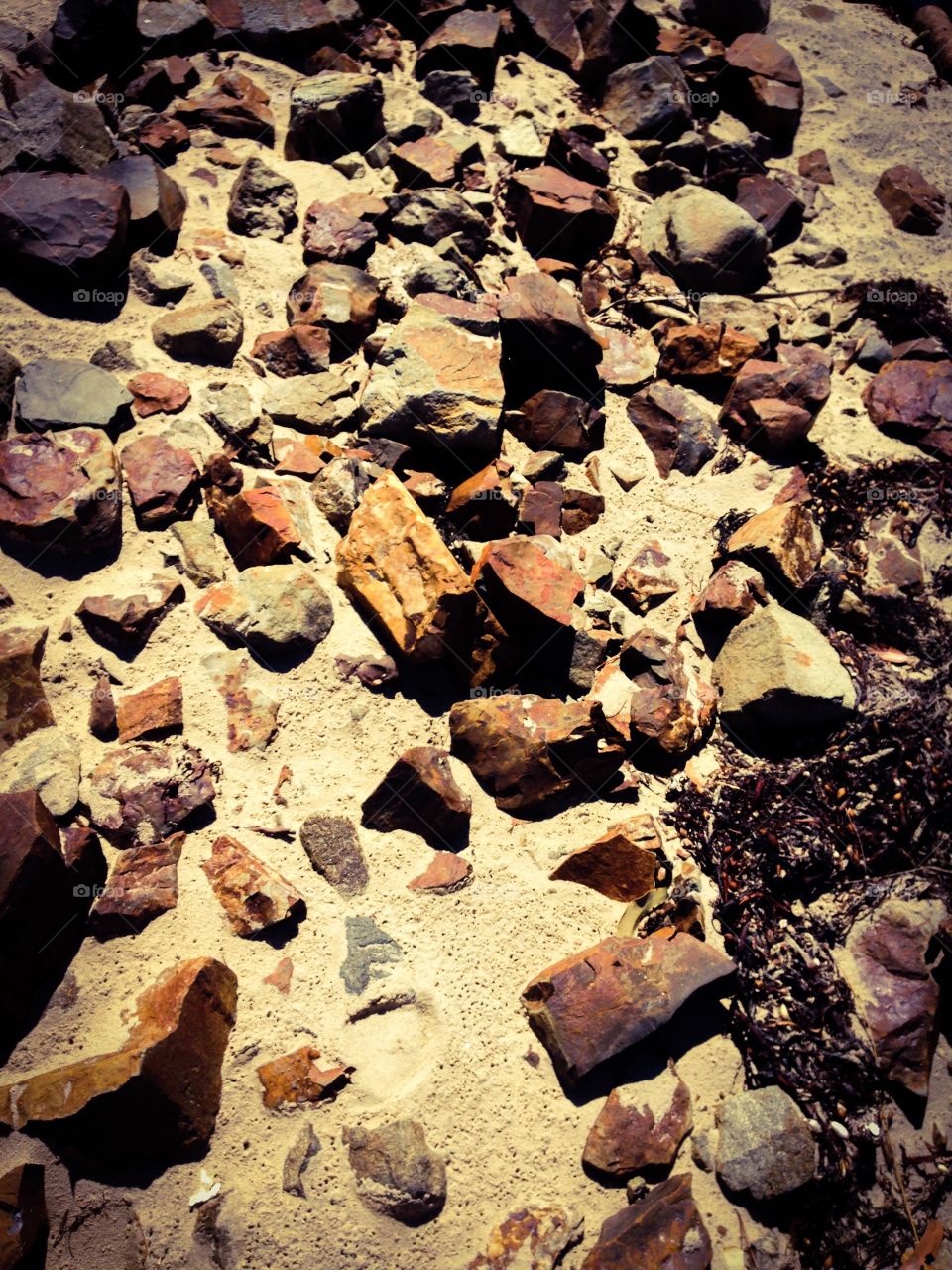 Rocks. Unsorted pebbles at a beach in Bruny Island, Tasmania
