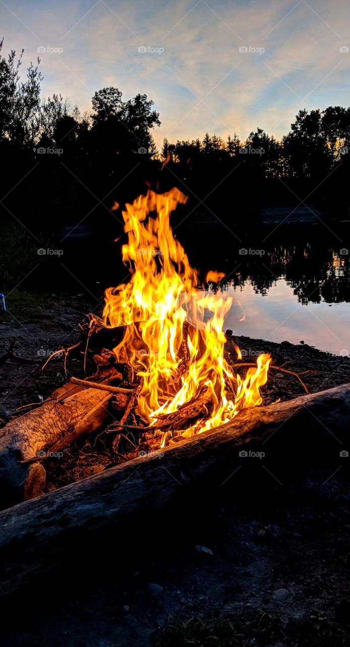 campfire by the water
