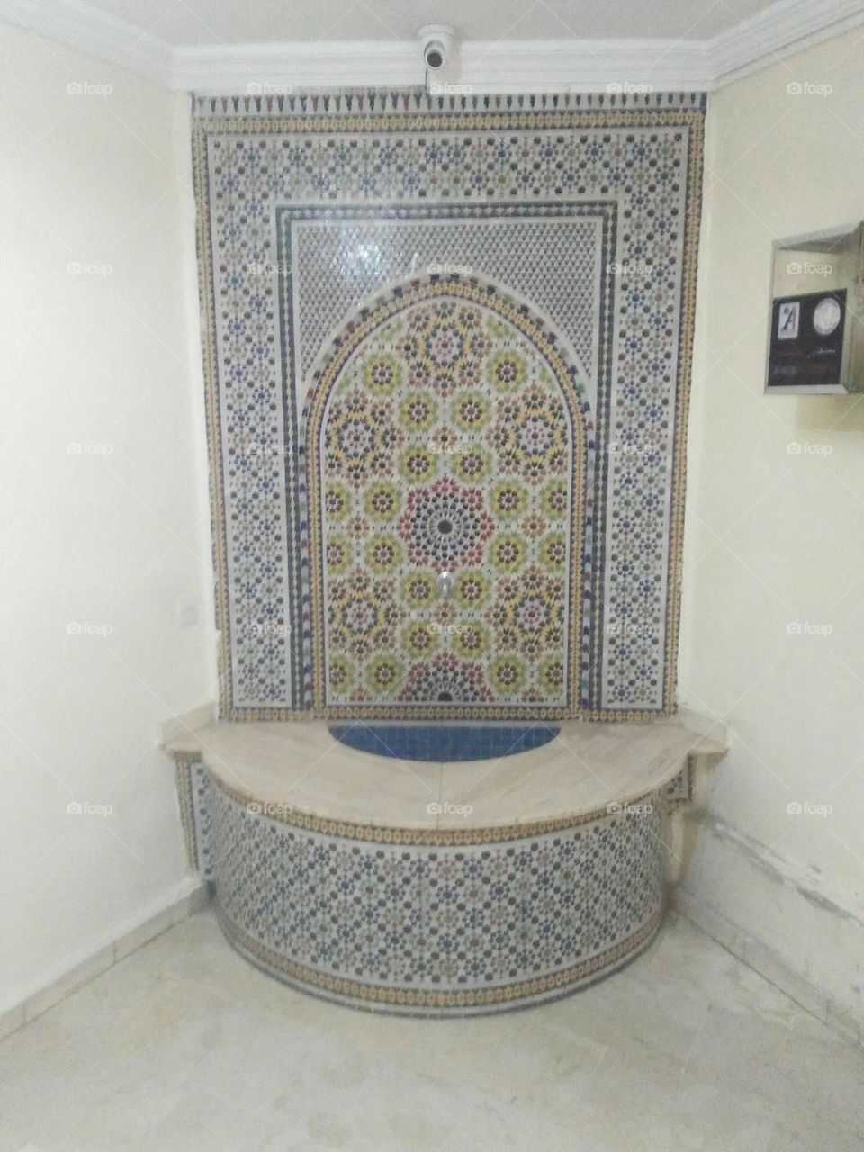 Ancient moroccan fountain built of zellij.