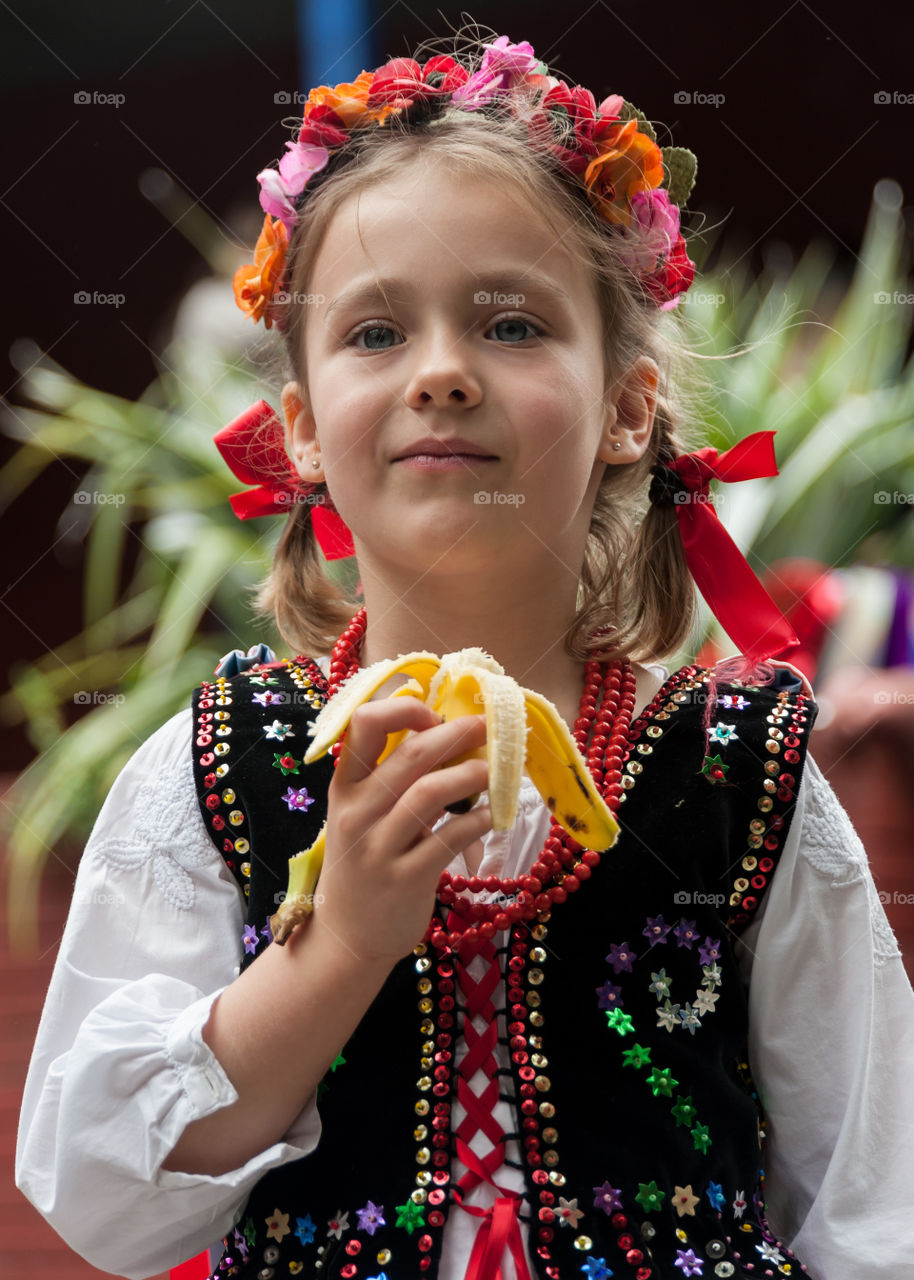 Girl dressed in Cracowian (Krakow in Poland) traditional regional folklore costume.