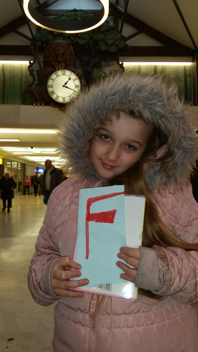 sign F