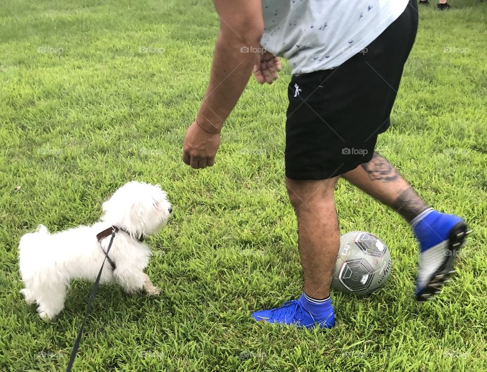 Playing soccer with my best friend 