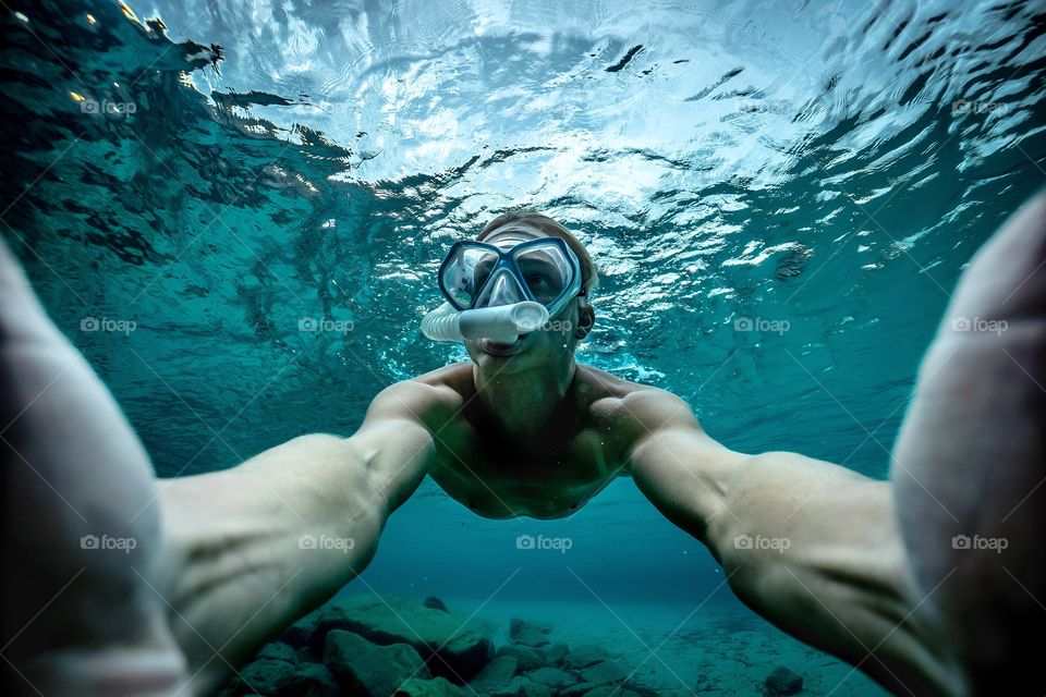 Snorkelling under water selfie in mallorca spain