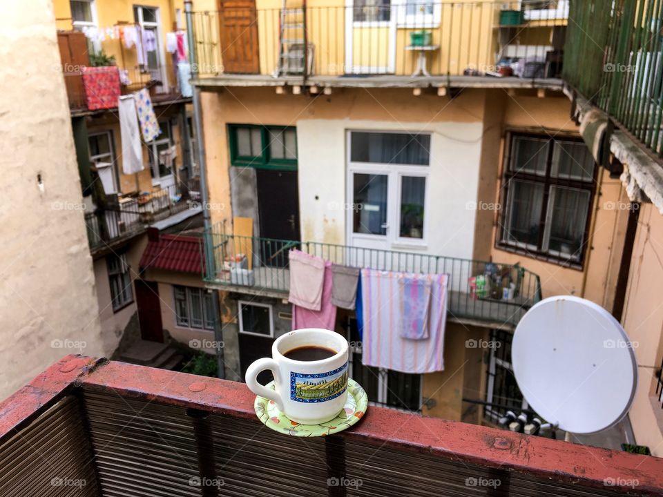 Enjoying coffee and cute windows inside old yards of Lviv. 