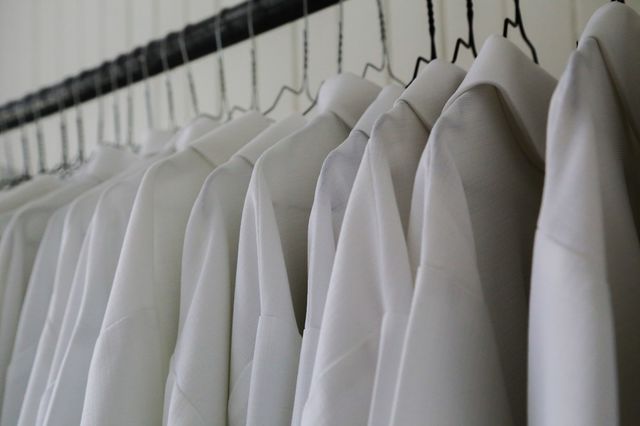 Close-up of clothes on hanger in closet