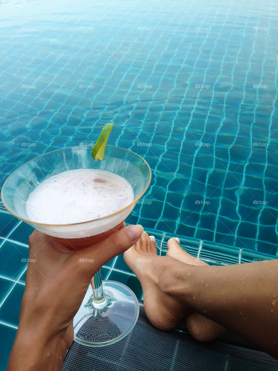 A cocktail of winner by the swimming pool 