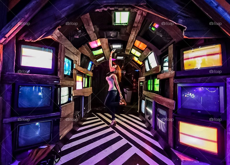 Meow wolf Santa Fe The gorgeous @iameilyn reaching for the right moment on the old school television structure