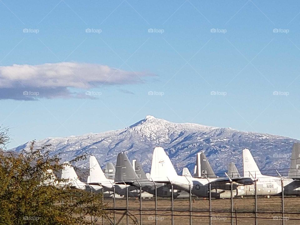 first snow on the mountains, looking on from airplane graveyard