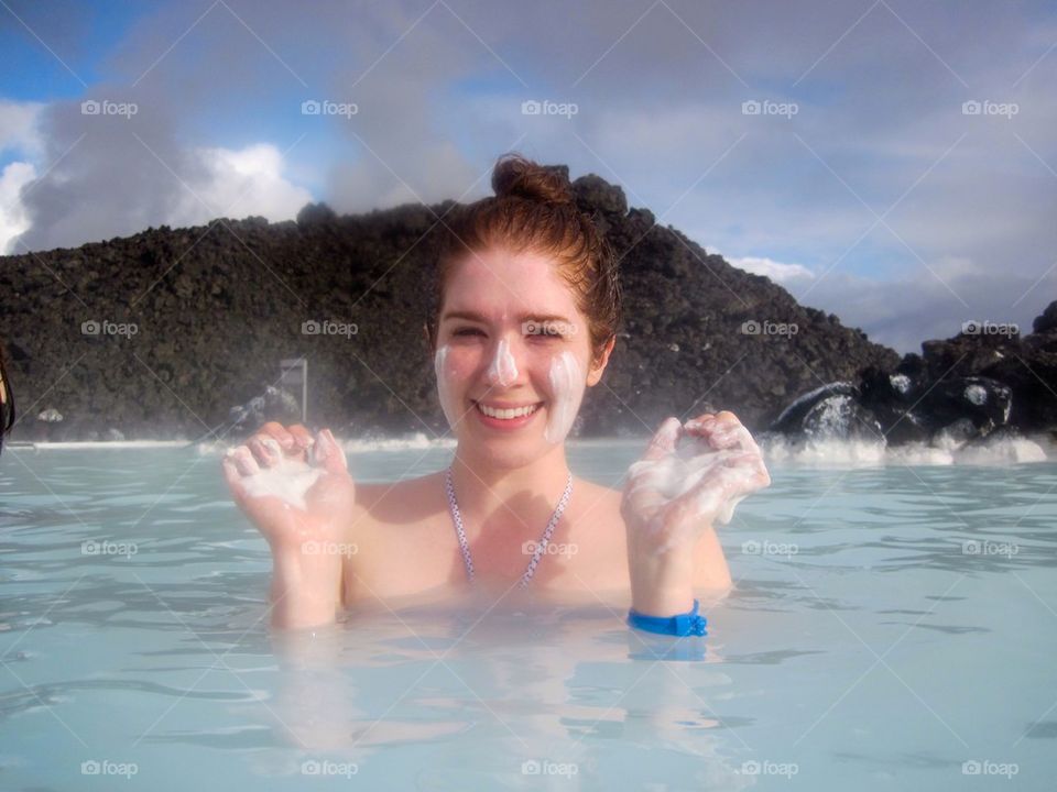 Woman in the blue lagoon on Iceland 