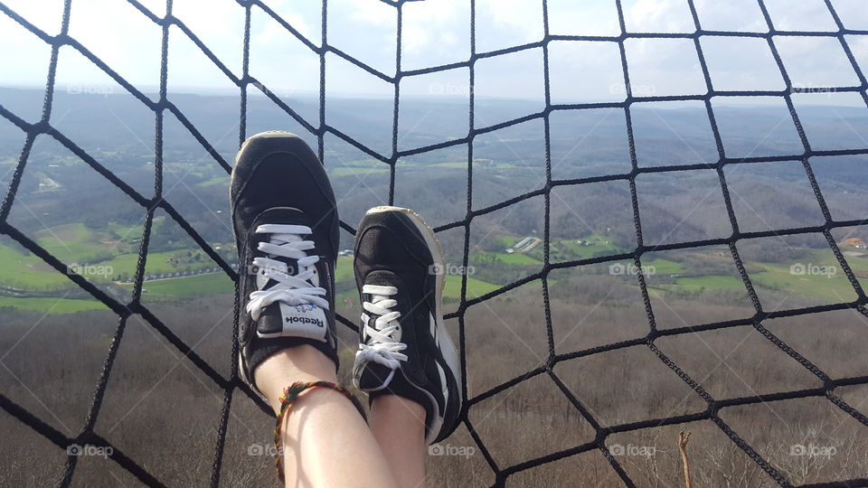 Just hanging off a cliff in a net.