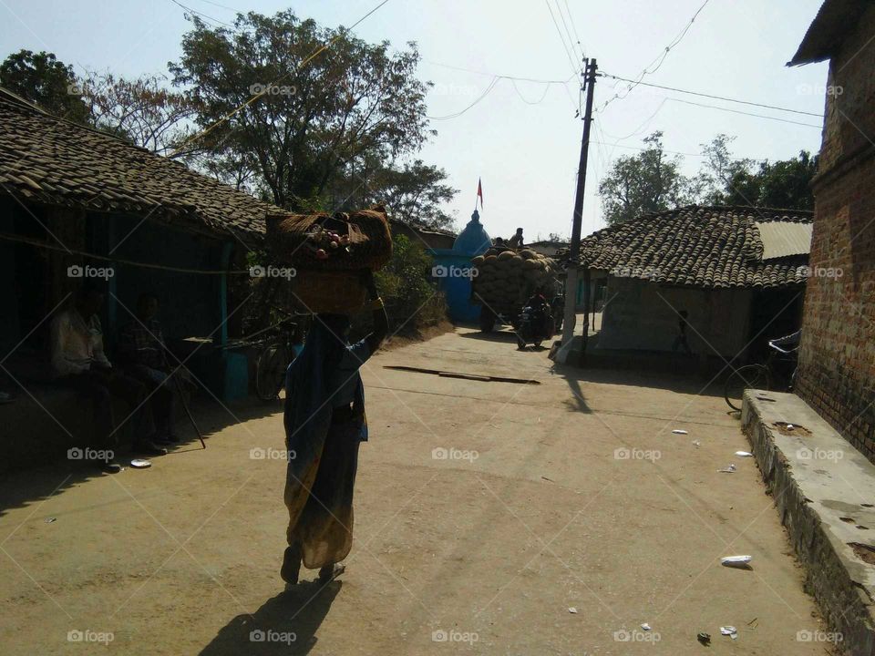 hut and path at villages in tha India