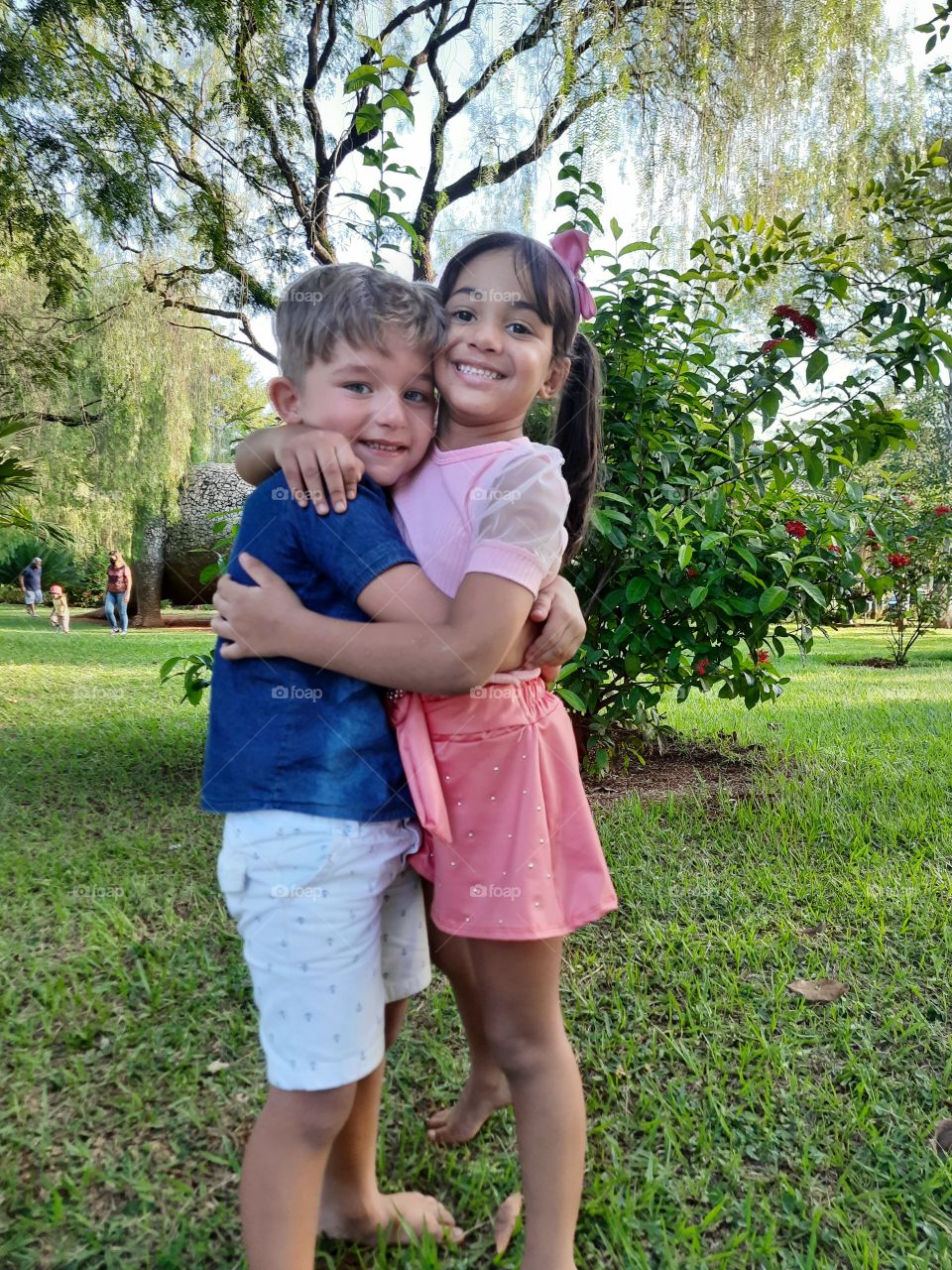 beautiful children smiling and hugging