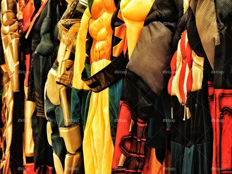 Halloween costumes hanging in a retail store