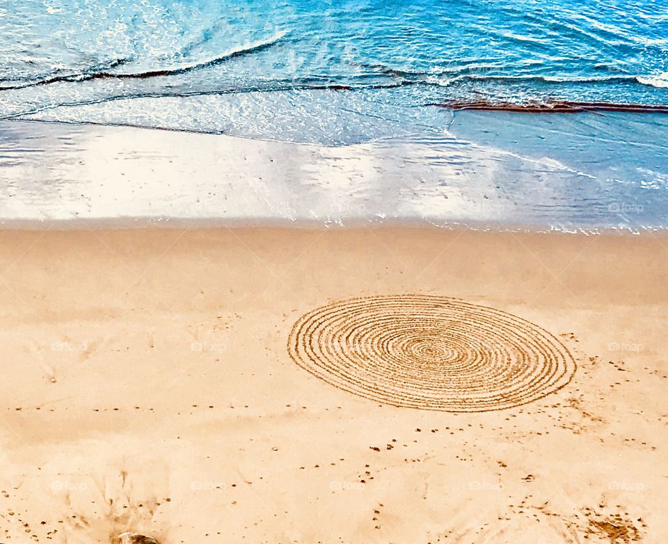 Life is the sky, sand, beach and ocean. Circle that and you get love.