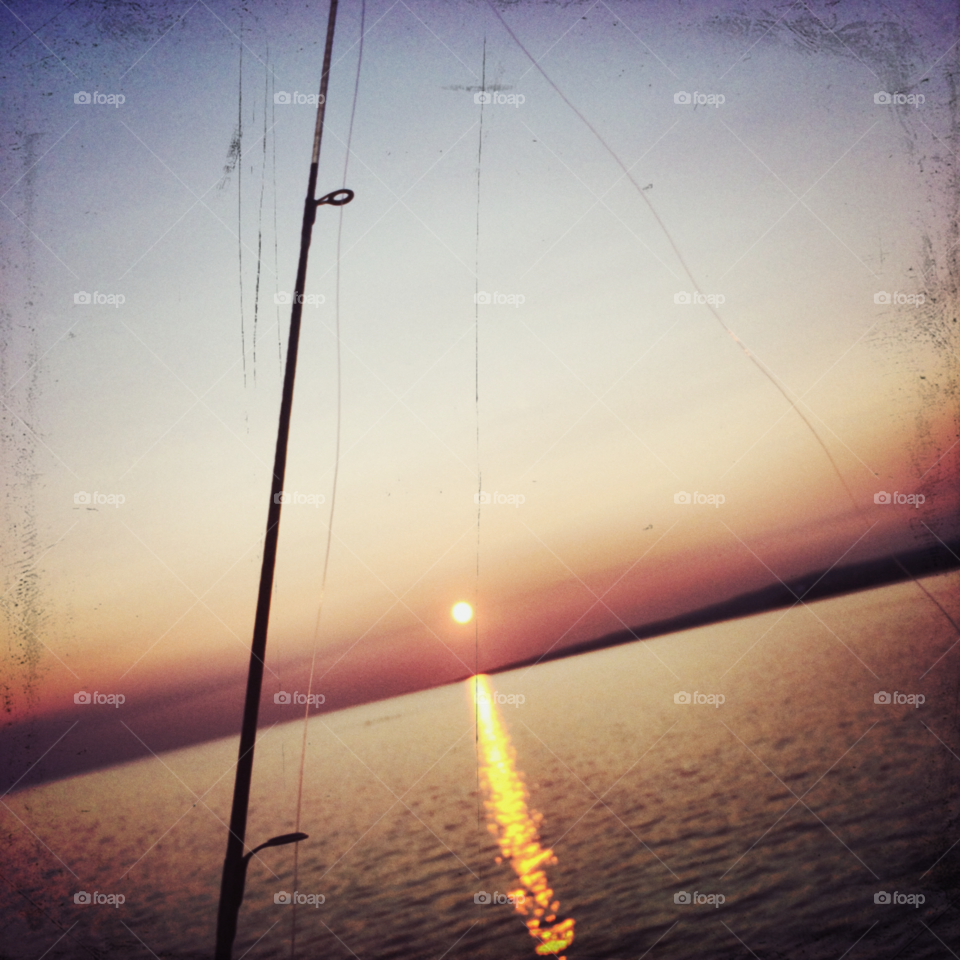 Fishing near the sunset