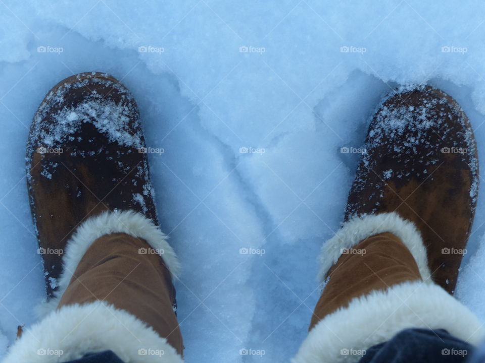 Snow boots walking in the snow