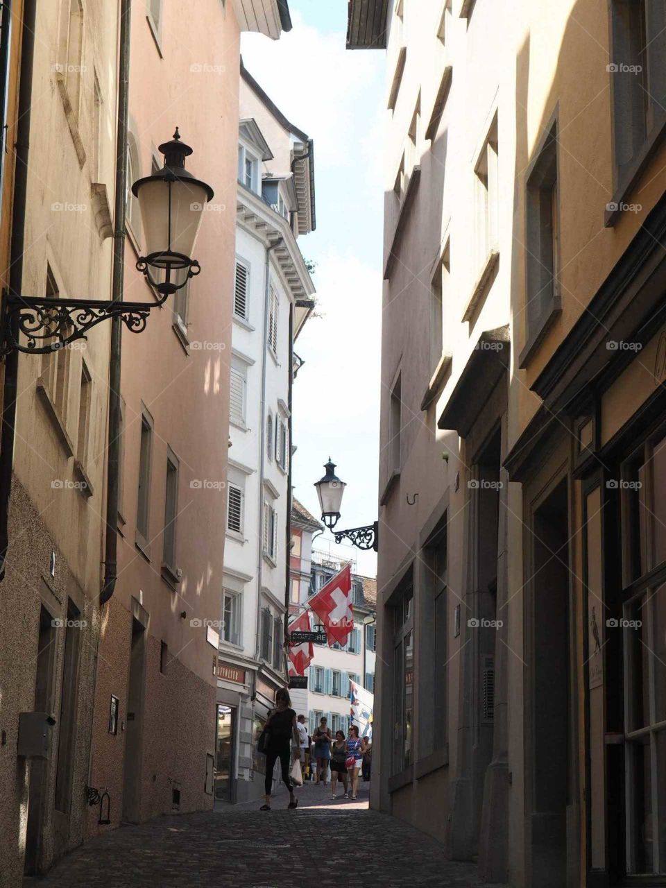 Small and cute street with colorful houses in the city center of Zürich, Switzerland.