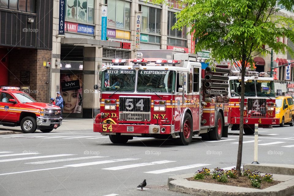 FDNY engine 54 responding to firealarm from firehouse at 8th Avenue in New york