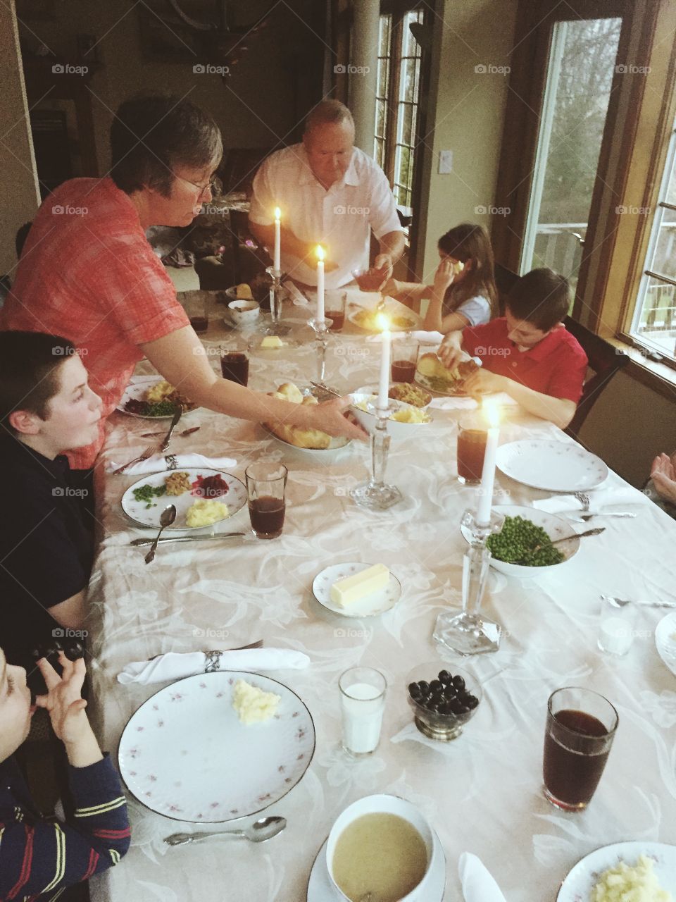 People serving food in house