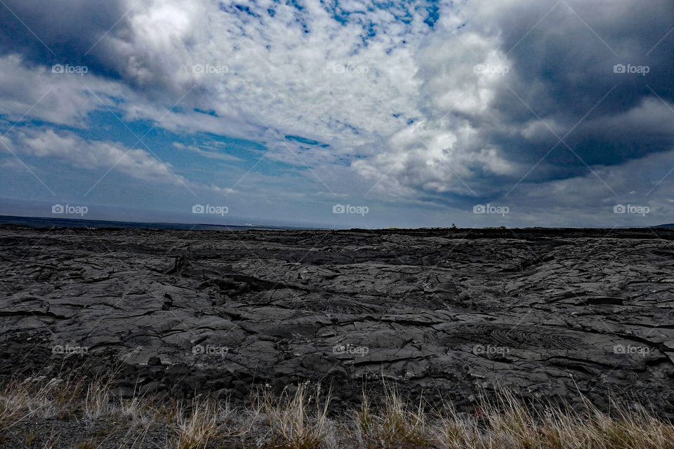 storm clouds, black lava