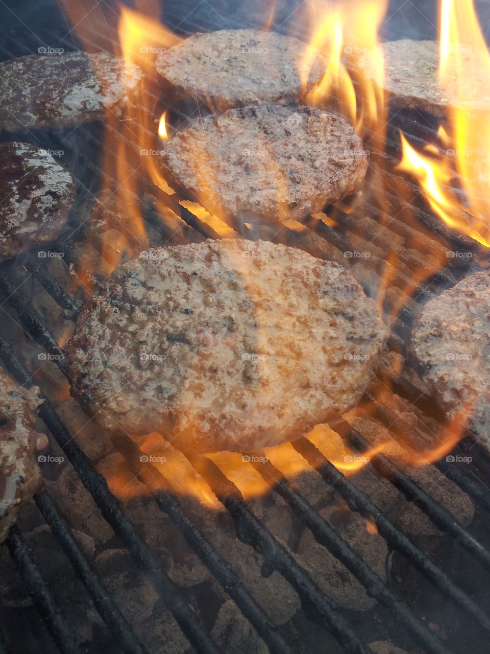 Flame kissed hamburgers on the grill