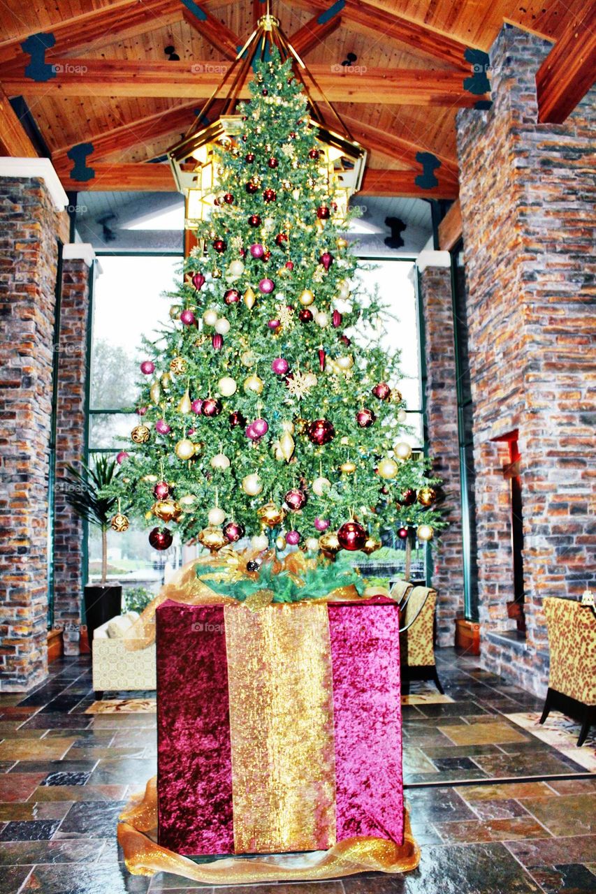 Christmas tree with a prison under it