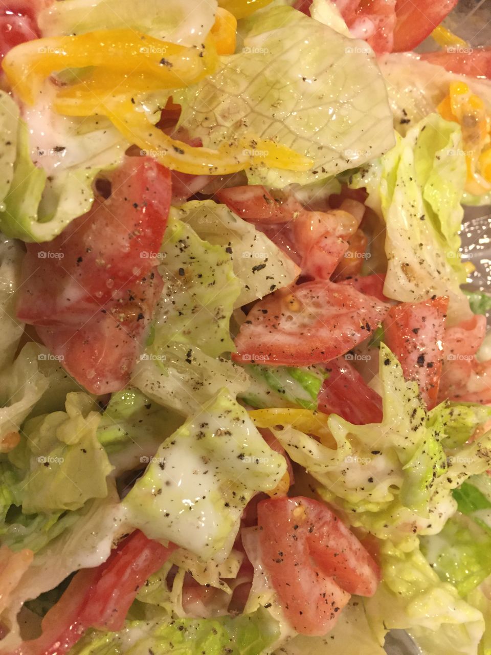 Fresh salad from lettuce and tomatoes peppers 